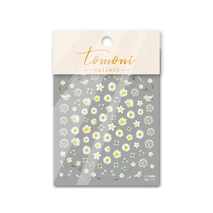 5D embossed white daisy nail stickers with floral patterns on a professional packaging