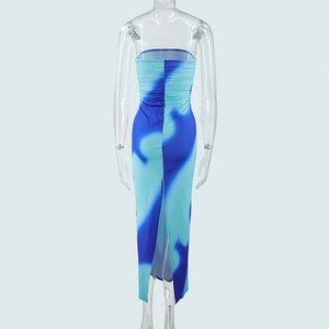 Detail of slim-fit tube maxi dress with blue gradient print and back slit design