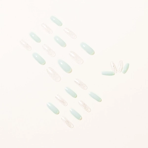 Long oval mint green and silver glitter press on nail set with 24 pieces set on white