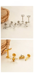Close-up of internal thread labret studs with marquise zircon in gold and silver
