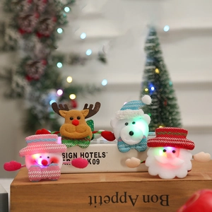 LED glowing Christmas wristbands set with Santa, reindeer, and snowman plush toys