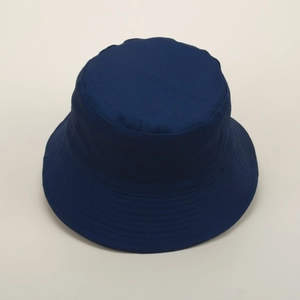 Detail view of a navy blue bucket hat showing reinforced brim stitching and cotton fabric