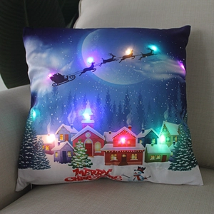 Detail of LED Christmas pillow with light-up snowman scene and Merry Christmas text