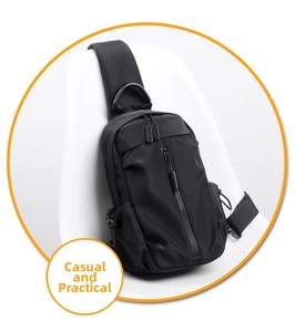 Detail view of durable black nylon crossbody chest bag with waterproof zipper and side drawstring