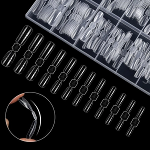 Macro detail of flexible transparent nail dual forms with scale lines in storage box