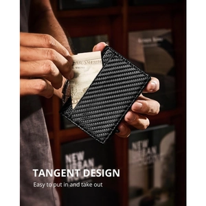 Close-up showing carbon fiber wallet with easy access slot for inserting paper money