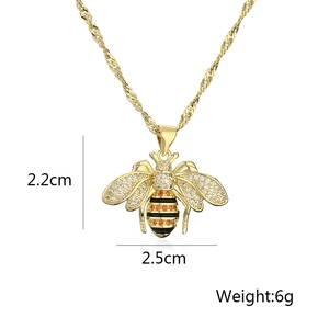 Detail of bee pendant with measurements: 2.2cm height, 2.5cm width, weight 6g