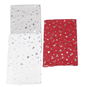 Detail of Christmas scarf showing silver foil snowflakes and trees on red and grey fabric