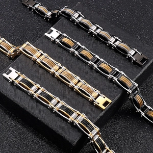 Close-up of industrial style men's stainless steel cable chain bracelets in mixed finishes