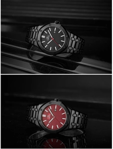 Close-up of black and red tapisserie dials on steel men watches with date display