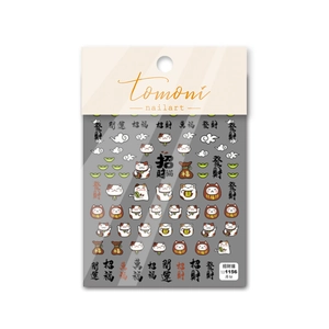 Detail of TO1156 nail stickers with cartoon lucky cat designs and gold ingot patterns