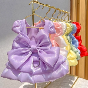 Elegant satin pet harness dress with large bow and D-ring in multiple pastel colors