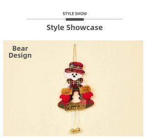 Detail of Christmas bear ornament with red plaid fabric, gold bell and Merry Christmas sign