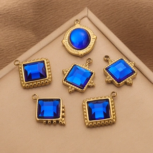Golden stainless steel pendants set with round and square blue glass stones for jewelry making