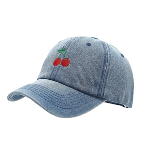 Denim baseball cap with cherry embroidery featuring a light blue washed finish