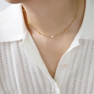 French style 18K gold plated pearl necklace featuring golden beads for elegant women