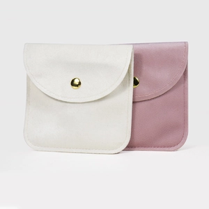 Microfiber jewelry pouches with gold snap buttons for rings and necklaces