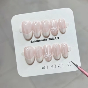 Handgefertigte Französische Weiße Künstliche Nägel Mit 3D Schleife Und Perlen Mandelform Süße Wiederverwendbare Fake Nails Damen