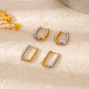 Two-tone gold and silver stainless steel rectangular and oval geometric hoop earrings