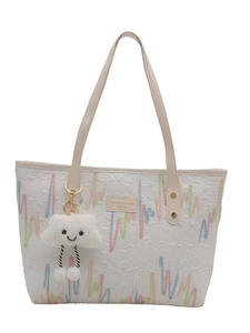 White canvas tote bag with colorful wave embroidery and a plush cloud charm for women