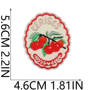 Detailed view of cherry embroidery patch with Cerises text and size measurements