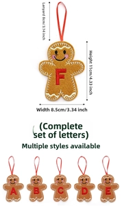 Detail view of gingerbread man alphabet felt ornaments with red ribbon hanging loops