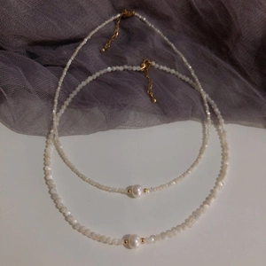 Elegant natural freshwater pearl necklace with cat's eye stone and 14K gold plated clasp