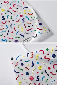 Detailed macro view of TS-2580 3D embossed nail stickers featuring colorful wave stripes