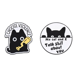 Cartoon black cat enamel pins featuring I Choose Violence and My Cat and I Talk Shit About You
