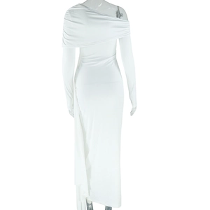 Detailed back view of white slim fit dress showing ruched shoulder and long sleeve texture