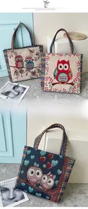 Detail of woven fabric handbags with bohemian owl patterns and colorful ribbon edges