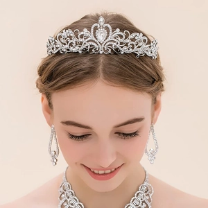 Elegant silver bridal crown jewelry set with sparkling rhinestones and matching necklace