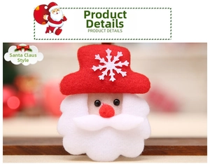 Detailed close-up of a handmade Santa Claus felt pin with snowflake pattern and red nose