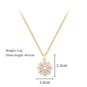 Vue détaillée du pendentif fleur en zircon rotatif avec les dimensions et le poids