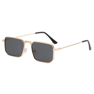 Detailed close-up of square gold metal frame sunglasses with dark grey lenses