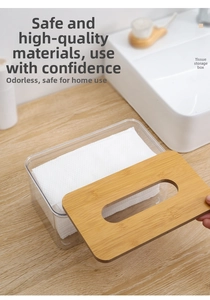 Macro detail of Nordic clear tissue box with bamboo lid on a minimalist table