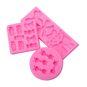 3-piece pink silicone mold set featuring bow and candy shapes for fondant cake decoration