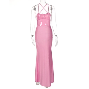 Detail view of pink bodycon dress featuring pleated chest and sheer shimmery waist panel