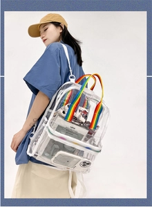 Clear PVC backpack with rainbow handles and side mesh pocket shown on a model