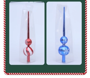Detail of red striped and blue snowflake patterned plastic Christmas tree toppers