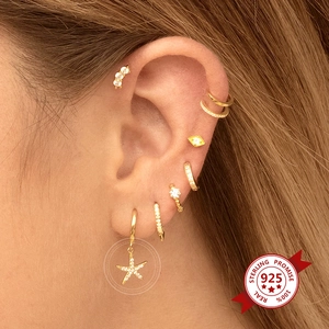 S925 sterling silver gold earrings set with starfish pendants and sparkling zircon studs