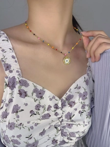 18K gold plated titanium necklace with colorful beads and blue eye floral pendant