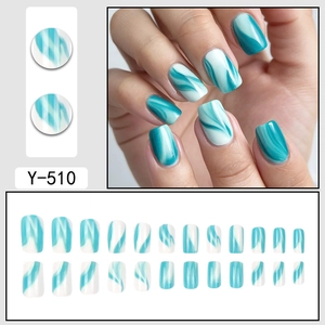 Blue and white marble swirl press-on nails set with 24 pieces and manicure styling