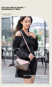 Chic small crossbody bag in brown checkered pattern with pink contrast flap and strap