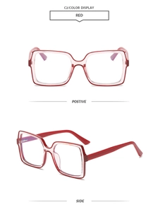 Front and side views of red oversized square fashion glasses with color-blocked frame