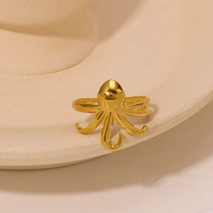 Bague pieuvre dorée minimaliste en acier inoxydable sur bord en céramique pour femme