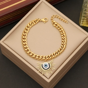 Double-layered gold Cuban chain bracelet with evil eye crystal pendant for women