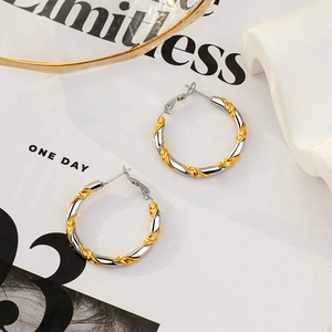 Two-tone twisted rope hoop earrings in gold and silver finish stainless steel