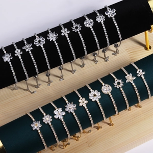 Bracelets de tennis fleurs ajustables en or et argent avec zircons sur des supports