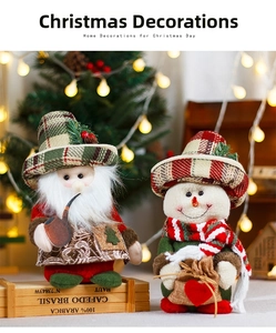 Close-up of vintage Santa and snowman dolls with plaid hats and festive accessories